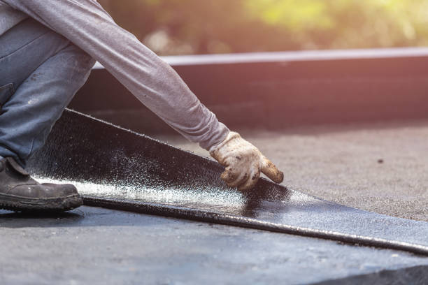Professional Emergency Waterproofing technician working in Marshall, IN